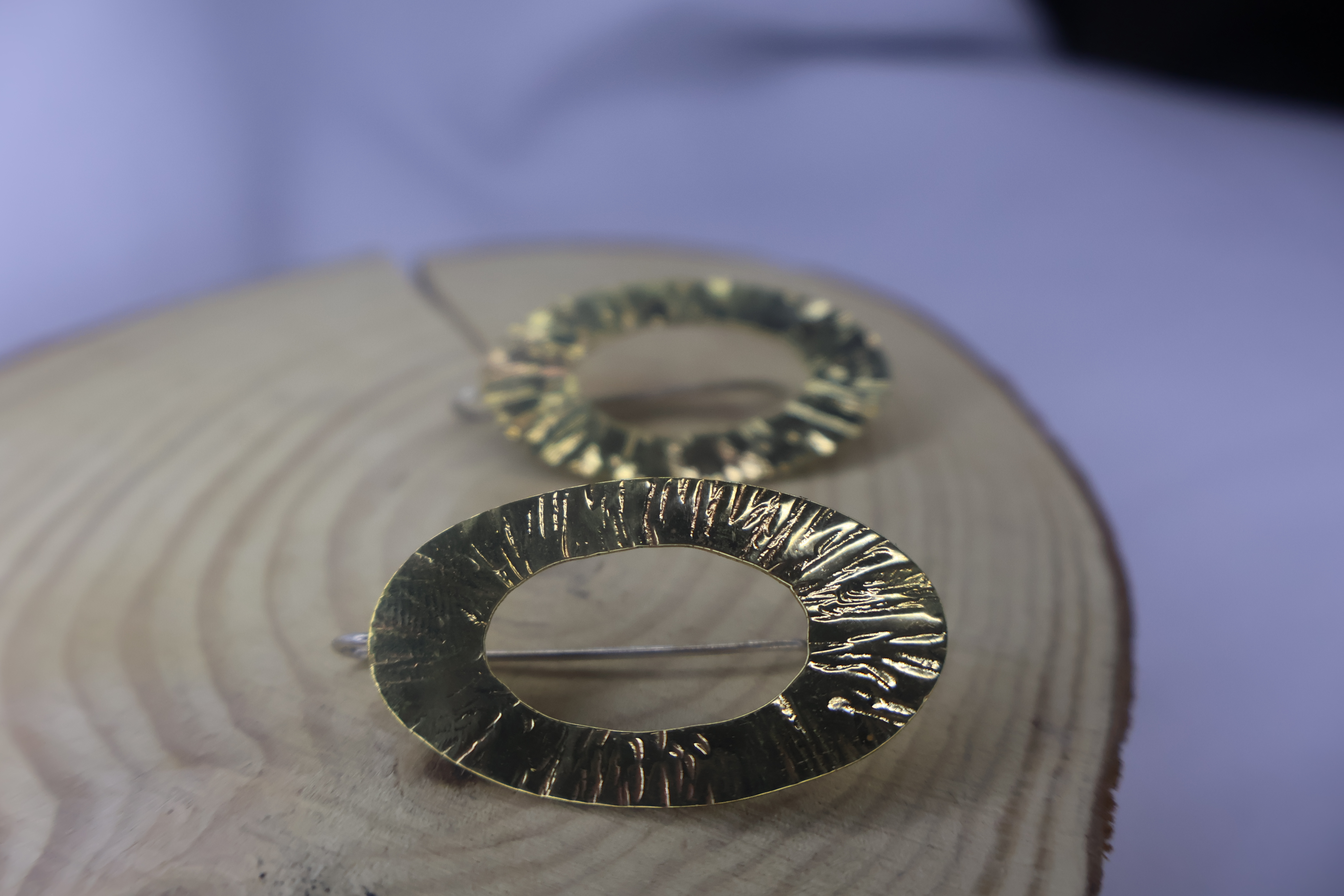 Hammered oval earring
